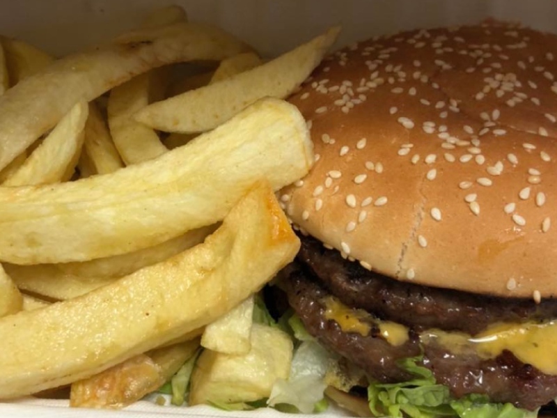 Juicy Burgers with Fries Served at Dino's Takeaway in Loanhead